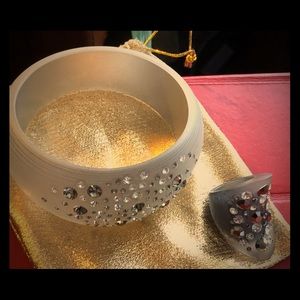 Chunky lucite bracelet with free ring. This is a statement piece.